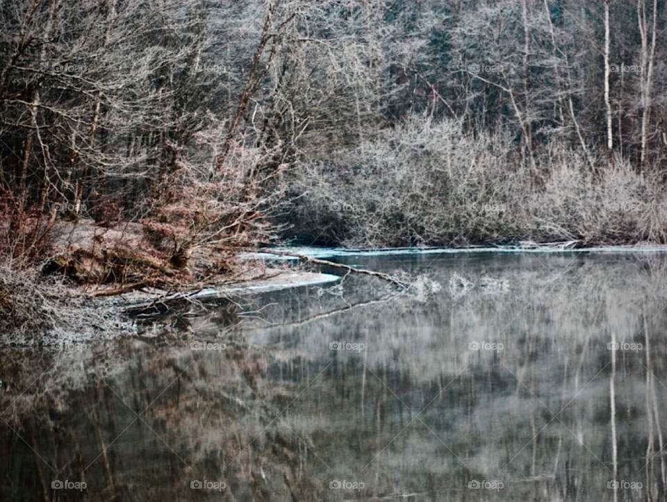 Reflection on a frozen lake 