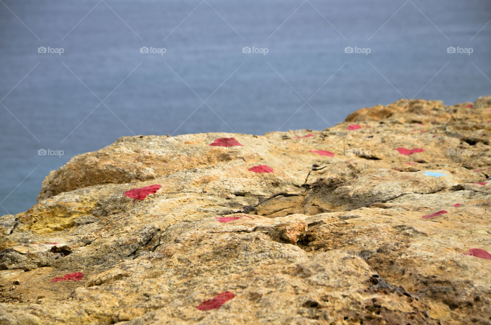 A love rock overlooking the ocean 