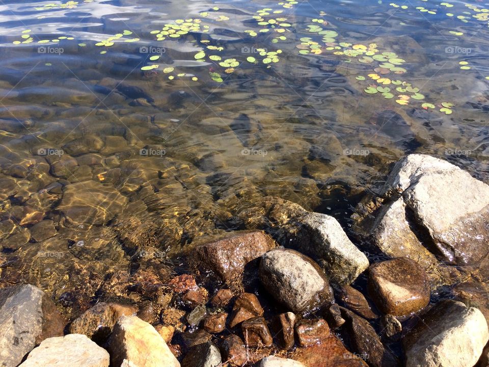 Lakes & rocks reflected by the sun.
