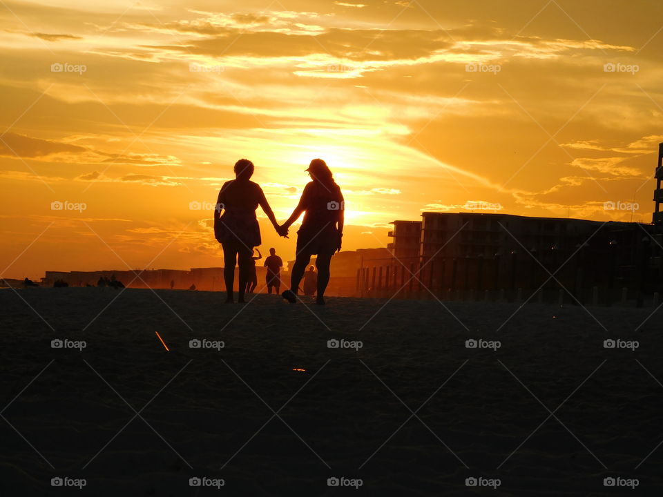 Silhouette of people on beach