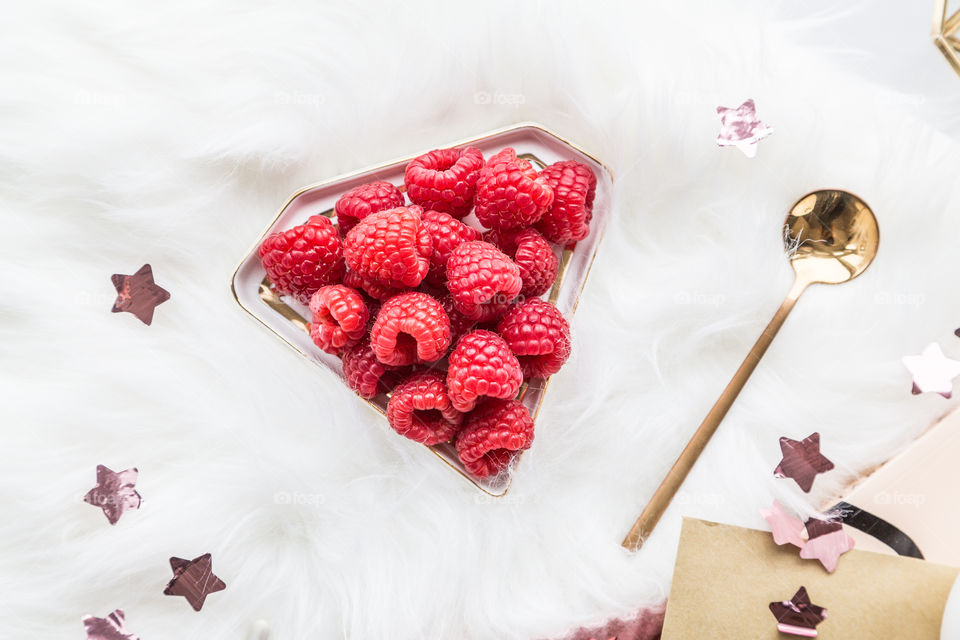 Fresh raspberry on white background 