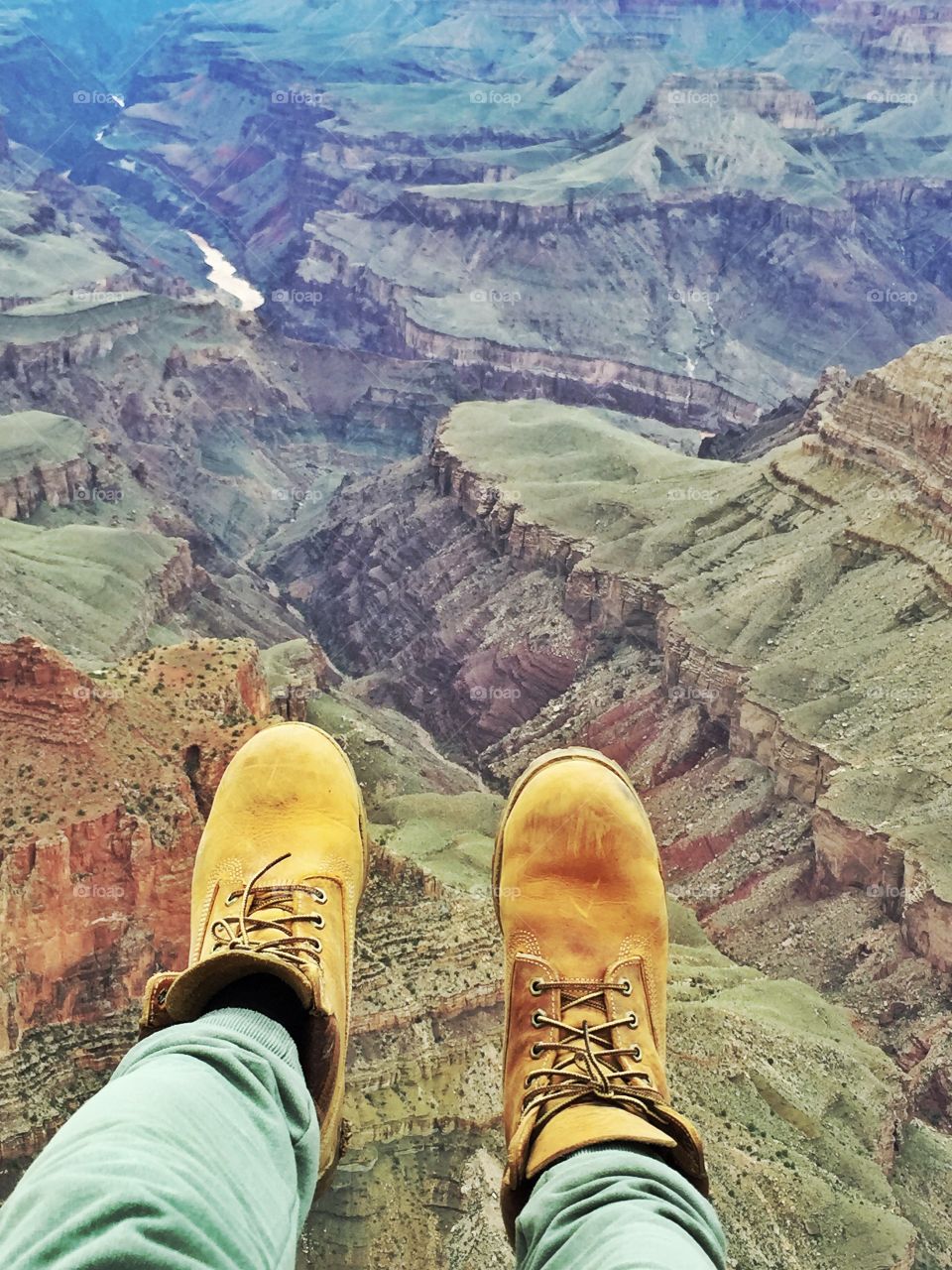 A dangerous moment of a man close to the grand canyon 