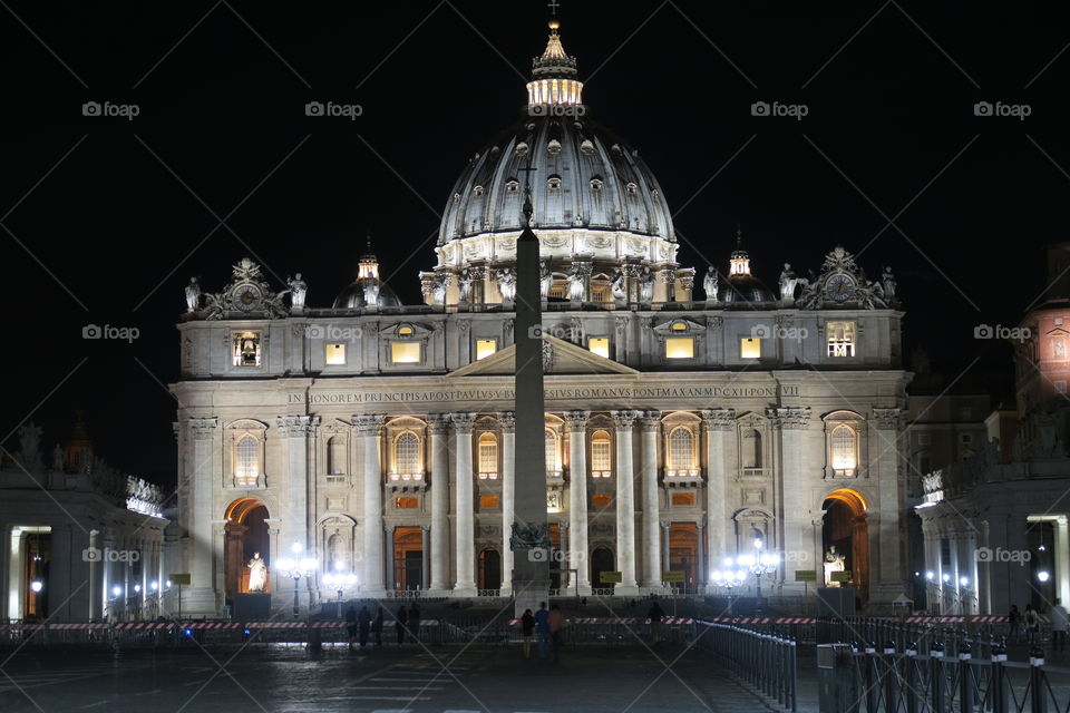 Rome, Vatican – summer 2016. St.  Peter's Basilica at night with barriers. The Papal Basilica of St. Peter has installed extra crowd barriers leading to the entrance.