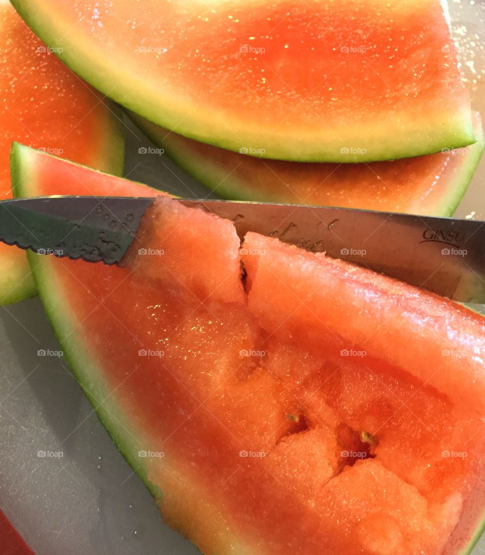 Cutting up watermelon 