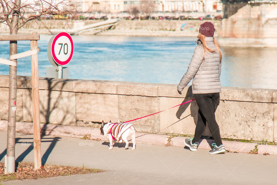 Fitness Young Girl With Her Dog Walking Outside