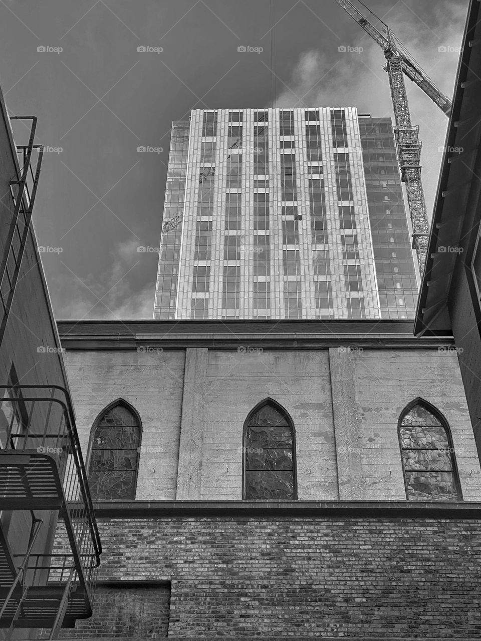 New building being constructed above an older church building 