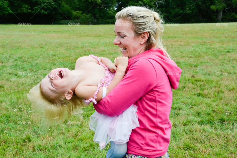 Smiling mother and daughter