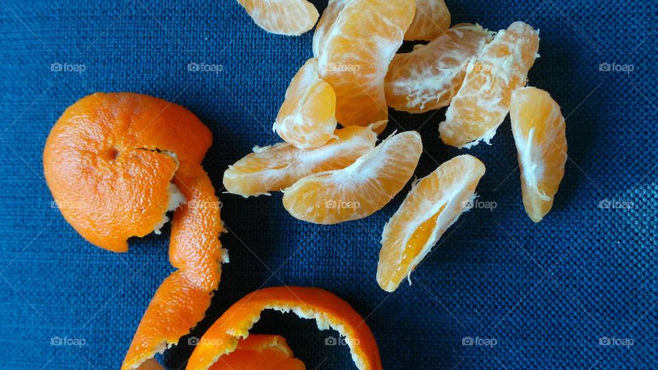 Close-up of orange fruit with slices