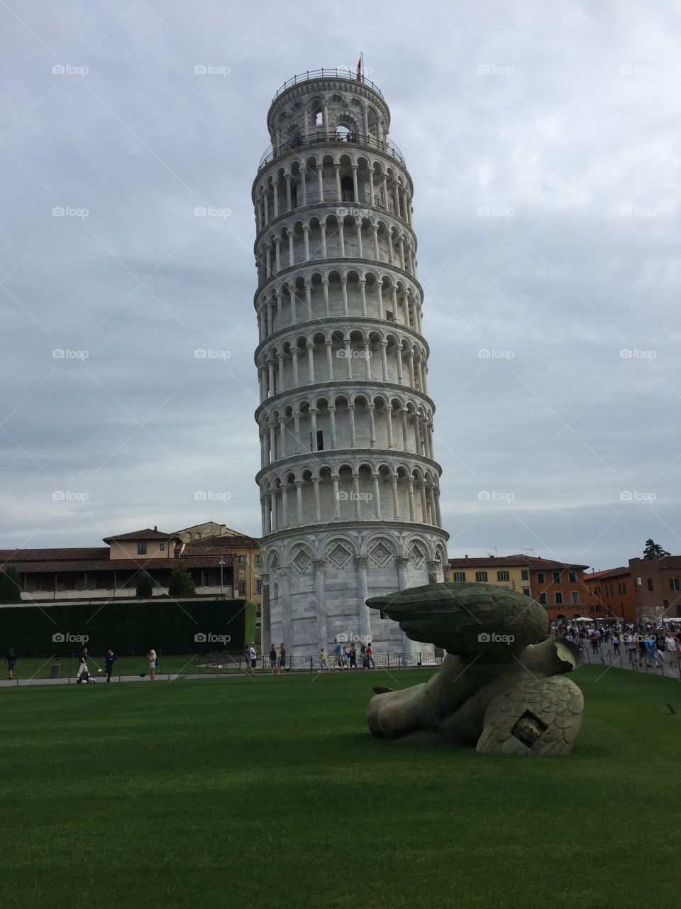 The fallen angel and Leaning tower, Pisa, Itally