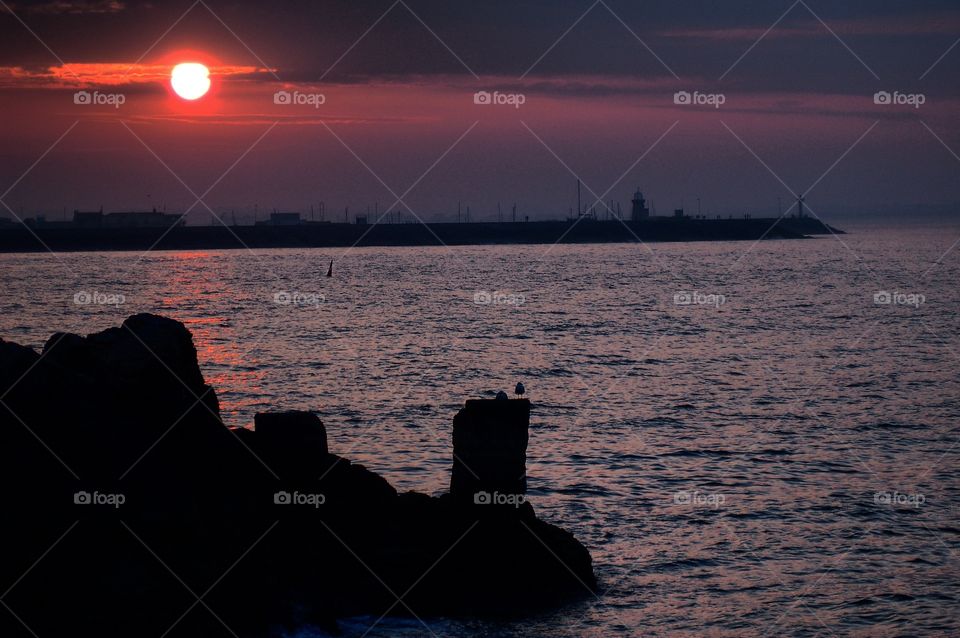 View of a sea at the time of sunset