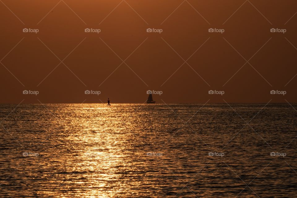 Sailing in the golden sea on holiday