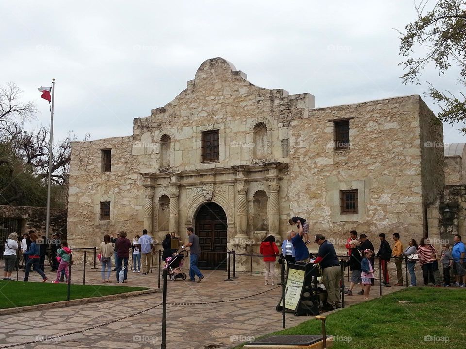 The Texas flag flying over the Alamo where 200 shoulders fought for freedom.