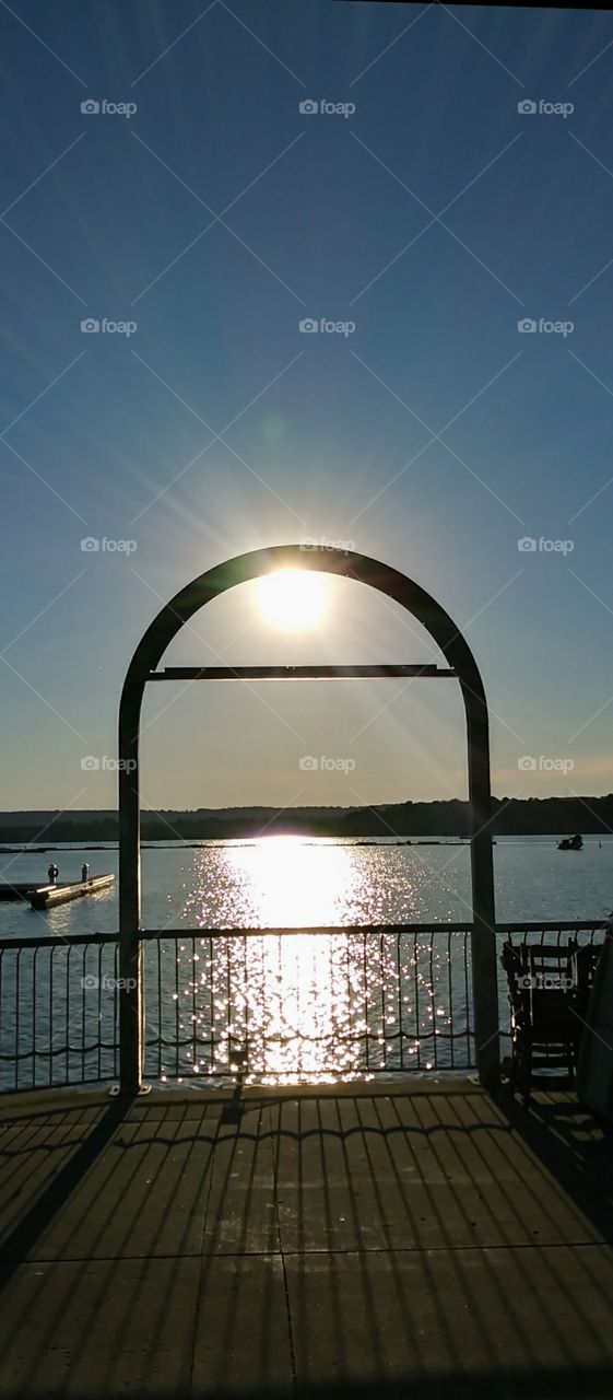 Sun setting over lake/ Hamilton Ontario