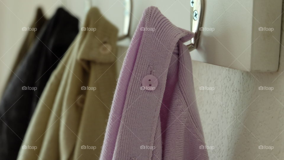 Close-up of a button on woolen cloth