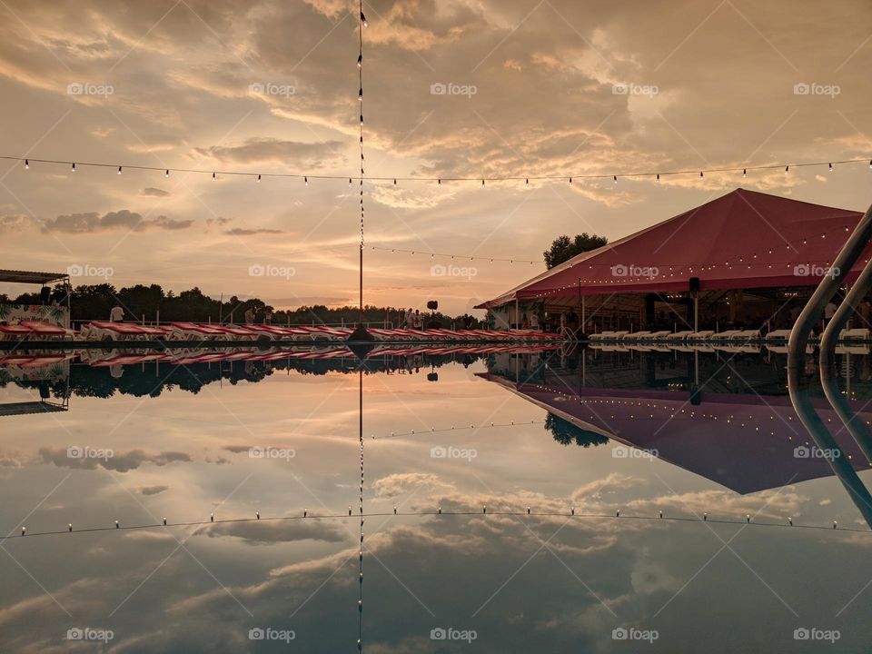 Sunset and swimming pool