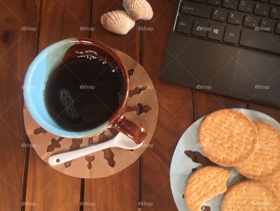 A break for a coffee with favorite biscuits 