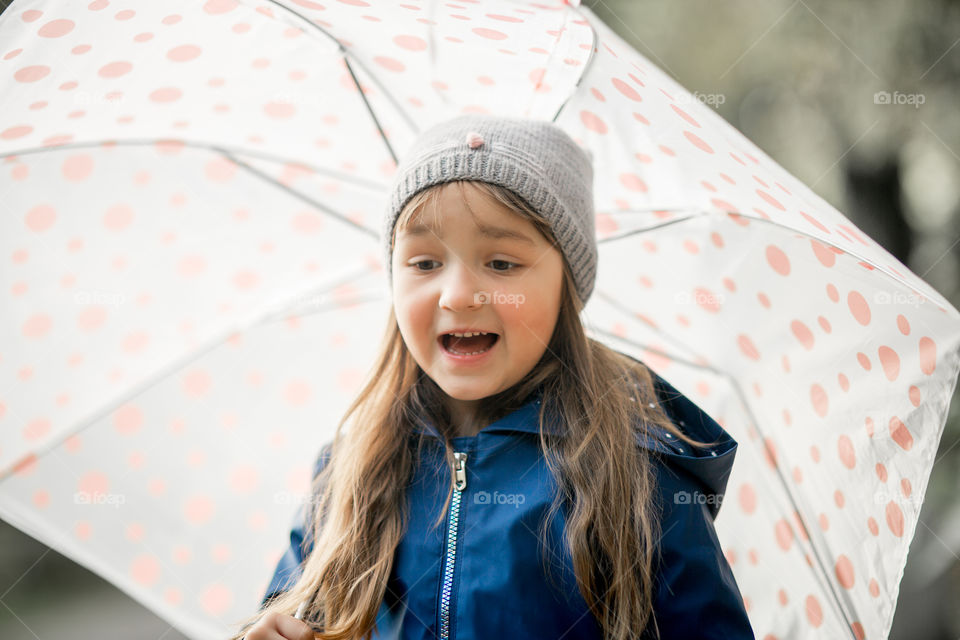 Little girl with umbrella 