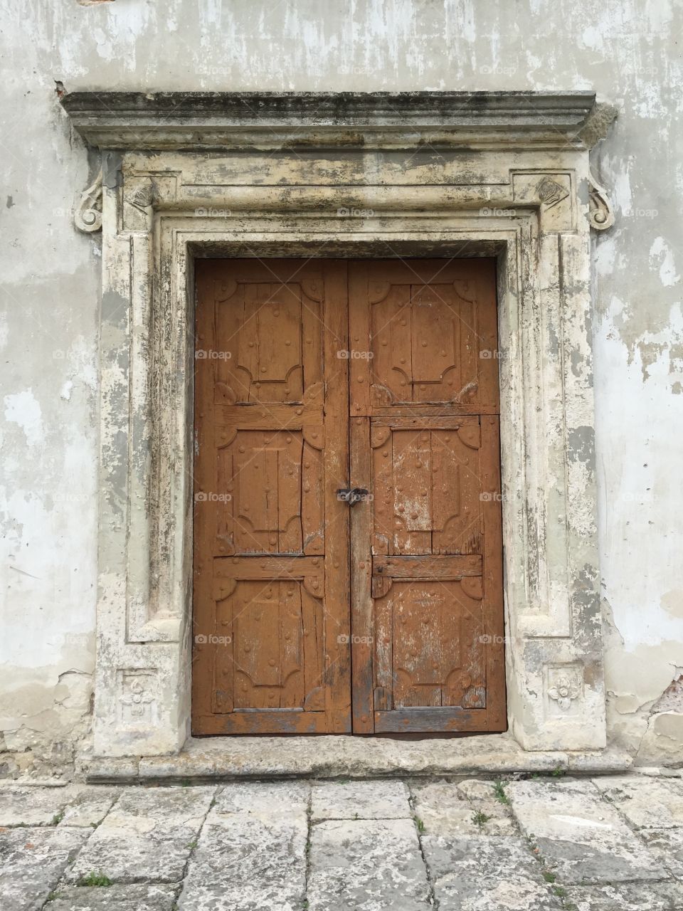 An old door to a Monastery of Capuchin in Olesko, Ukraine