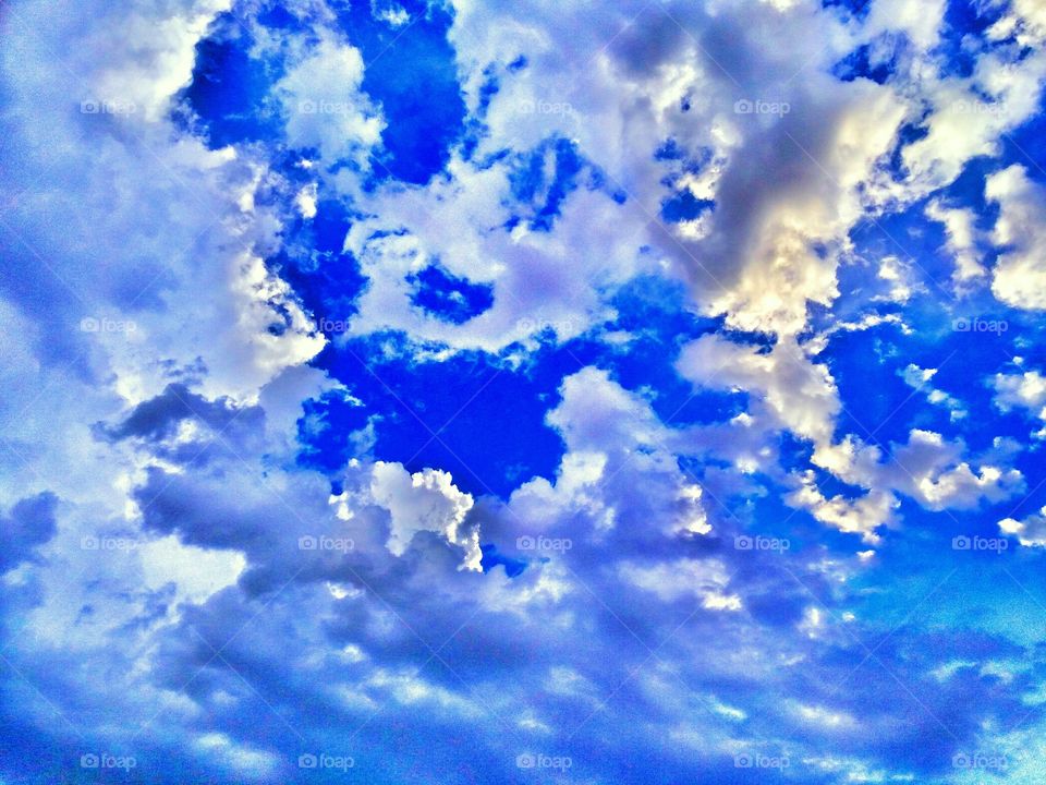 Clouds Against Bright Blue Sky High Contrast Photo