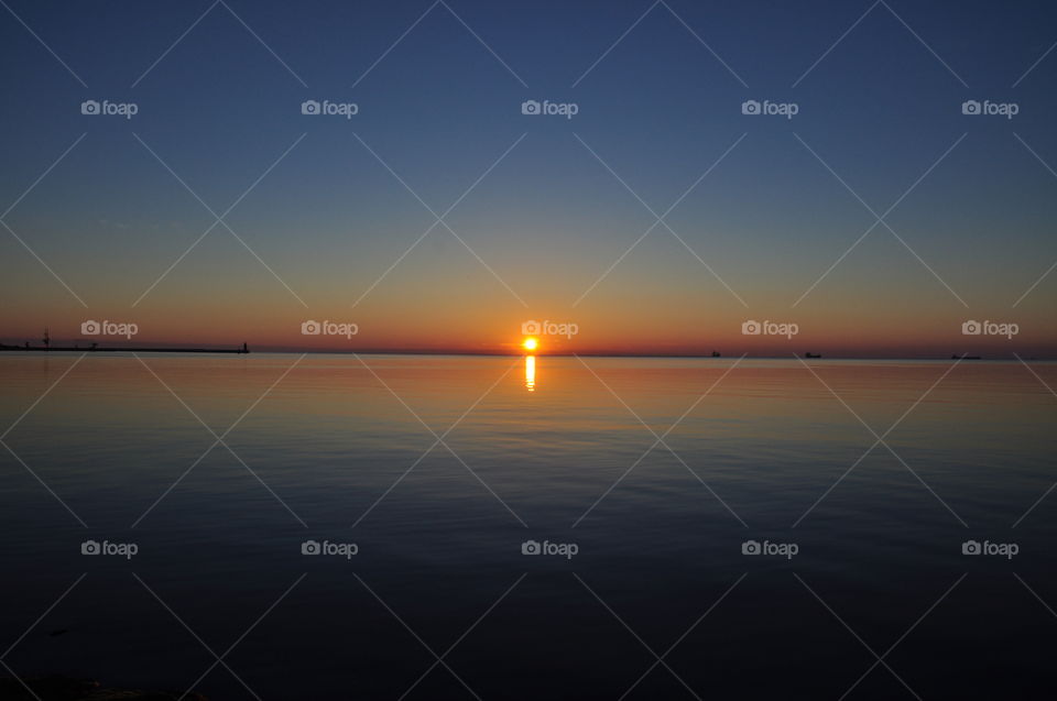 sunlight during sunrise over the Baltic sea in Poland