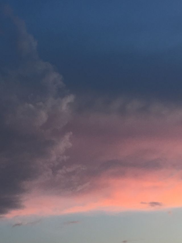 Sky pink and blue and purple . Storm coming 