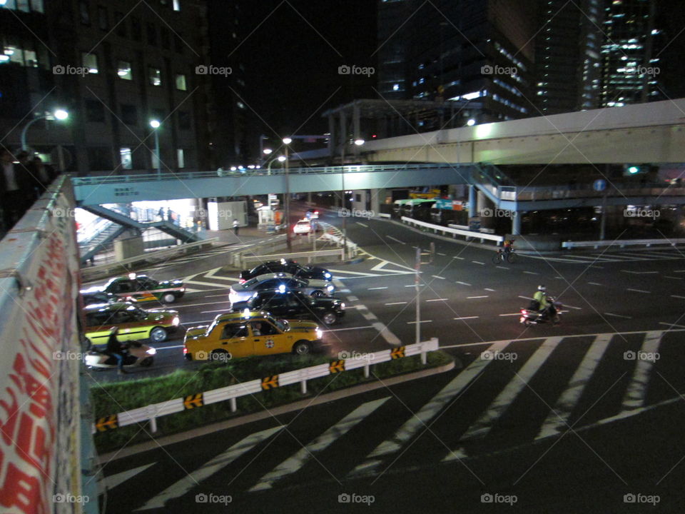 Night View of Tokyo Traffic from Top of a Bridge.