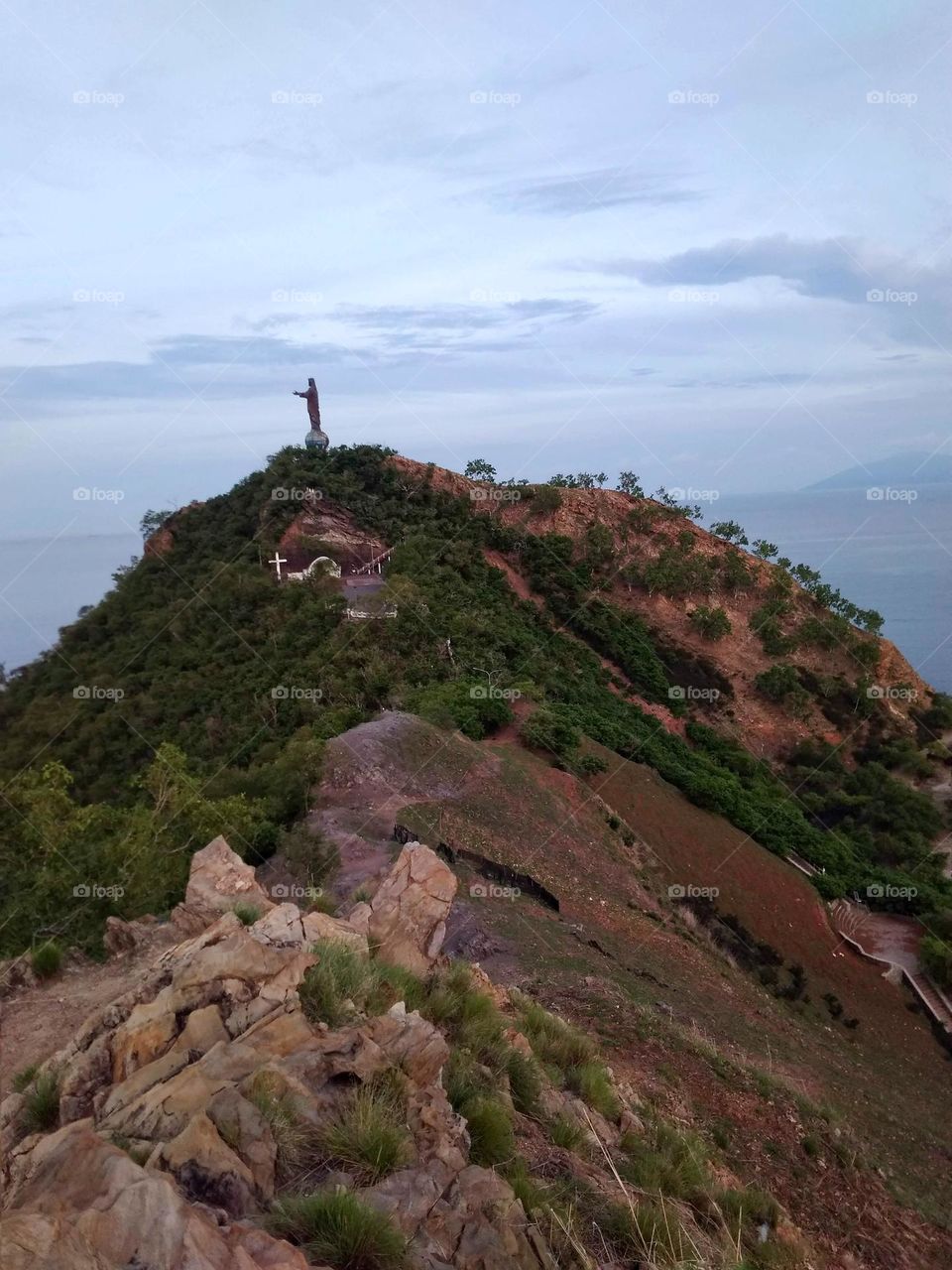 View of Cristo Rei,  Díli,  from a side hill