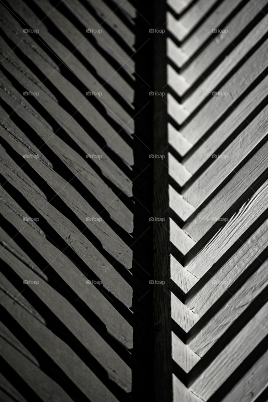 Symmetrical. The light and shadows produced this image of our front porch! It’s amazing how small things can transform something differently. 