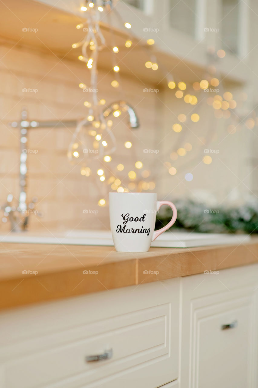 cup of coffee in a cozy festive Christmas atmosphere