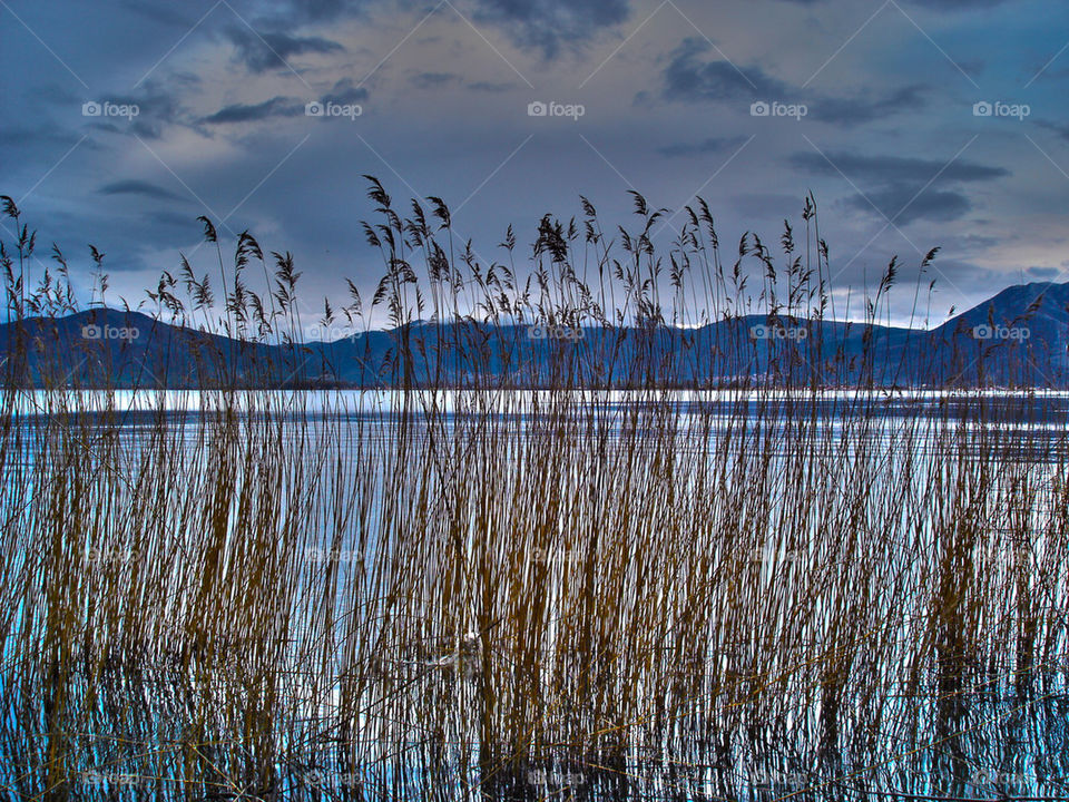 lake kastoria greece sky by pablogarcia