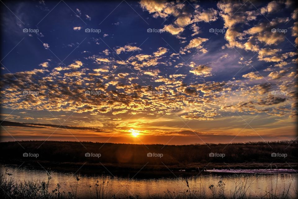 Idyllic view of lake during sunset