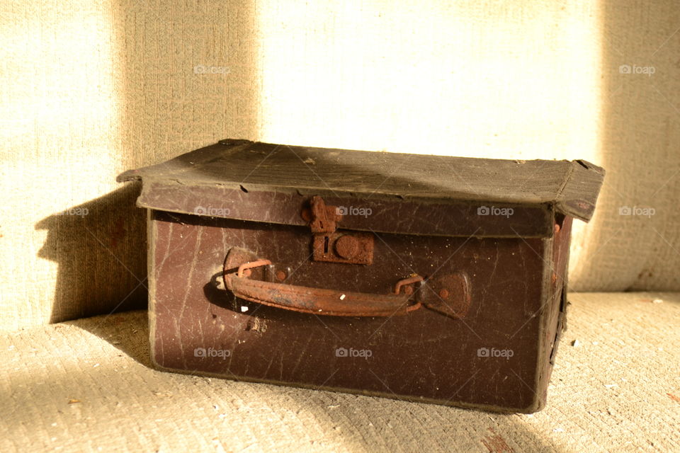 Close-up of rustic suitcase