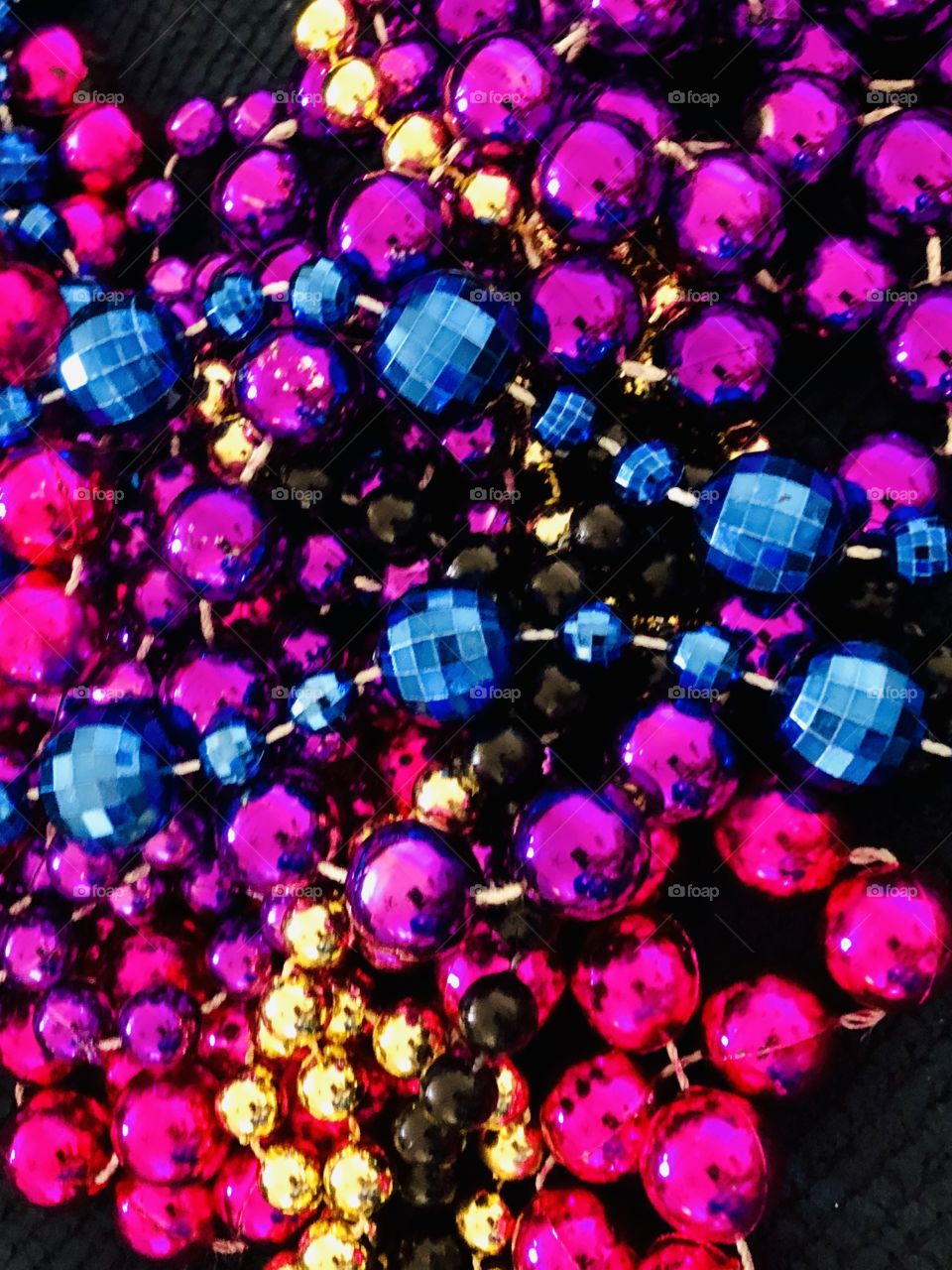 Multicolored beads purple gold blue purple pink black