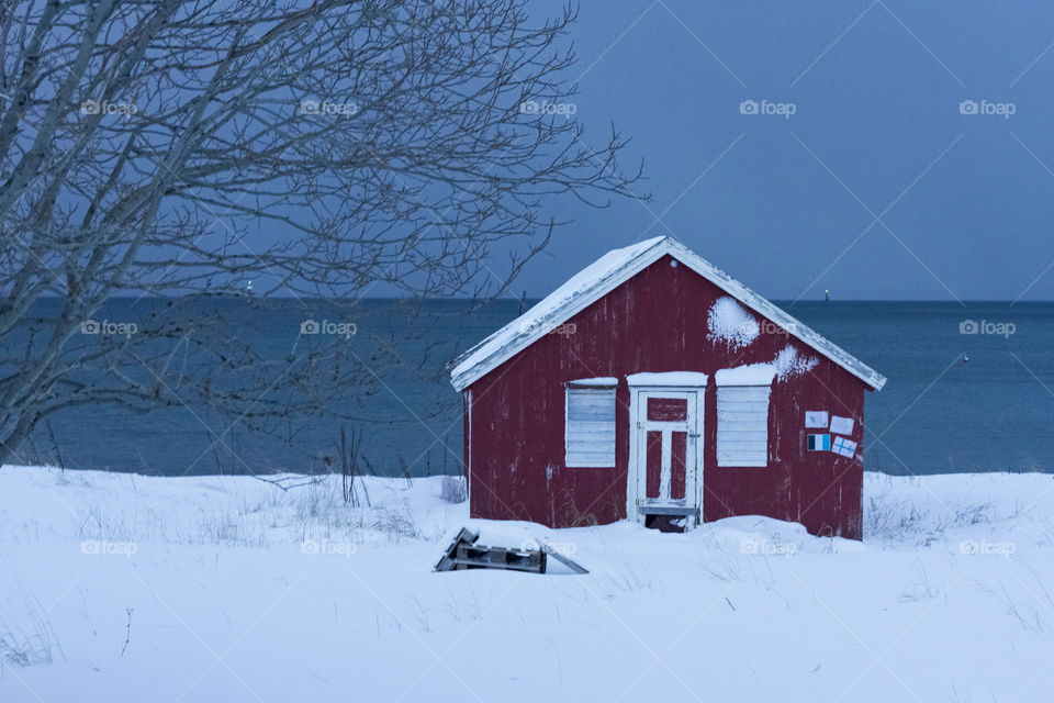Little house in the snow on Kvaløya, Troms, Norway