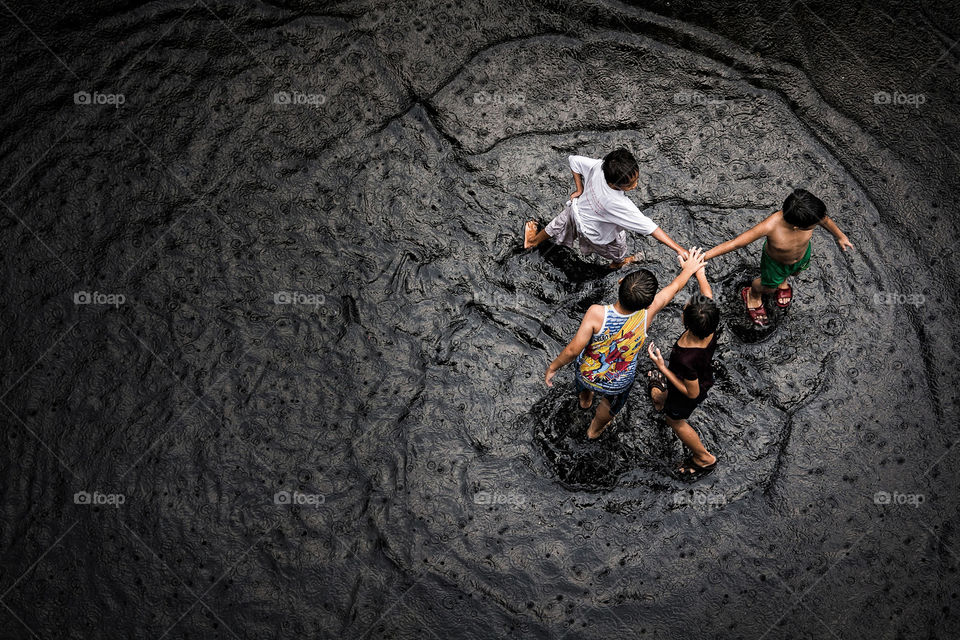 Playing under the rain