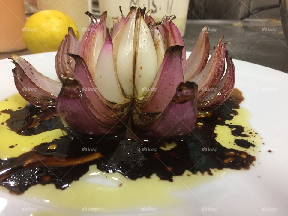Onion lotus as a decoration of hot dishes, more art garnish.