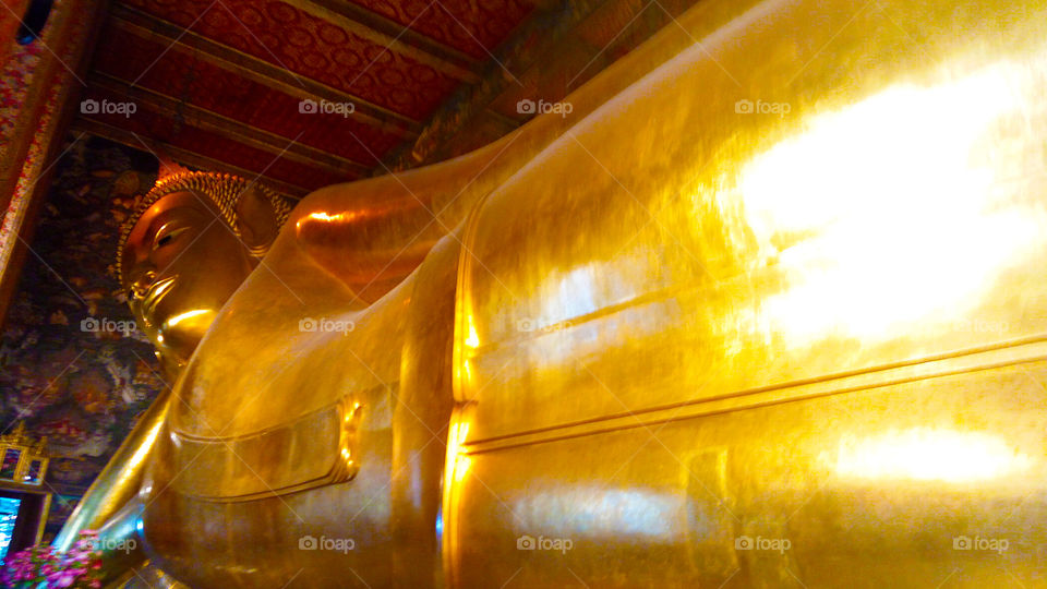 Wat Pho - Reclining Buddha located in Bangkok, Thailand.