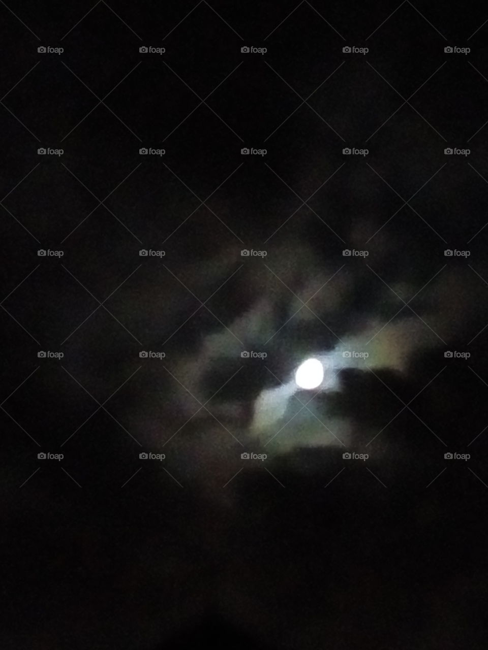 Moon through clouds