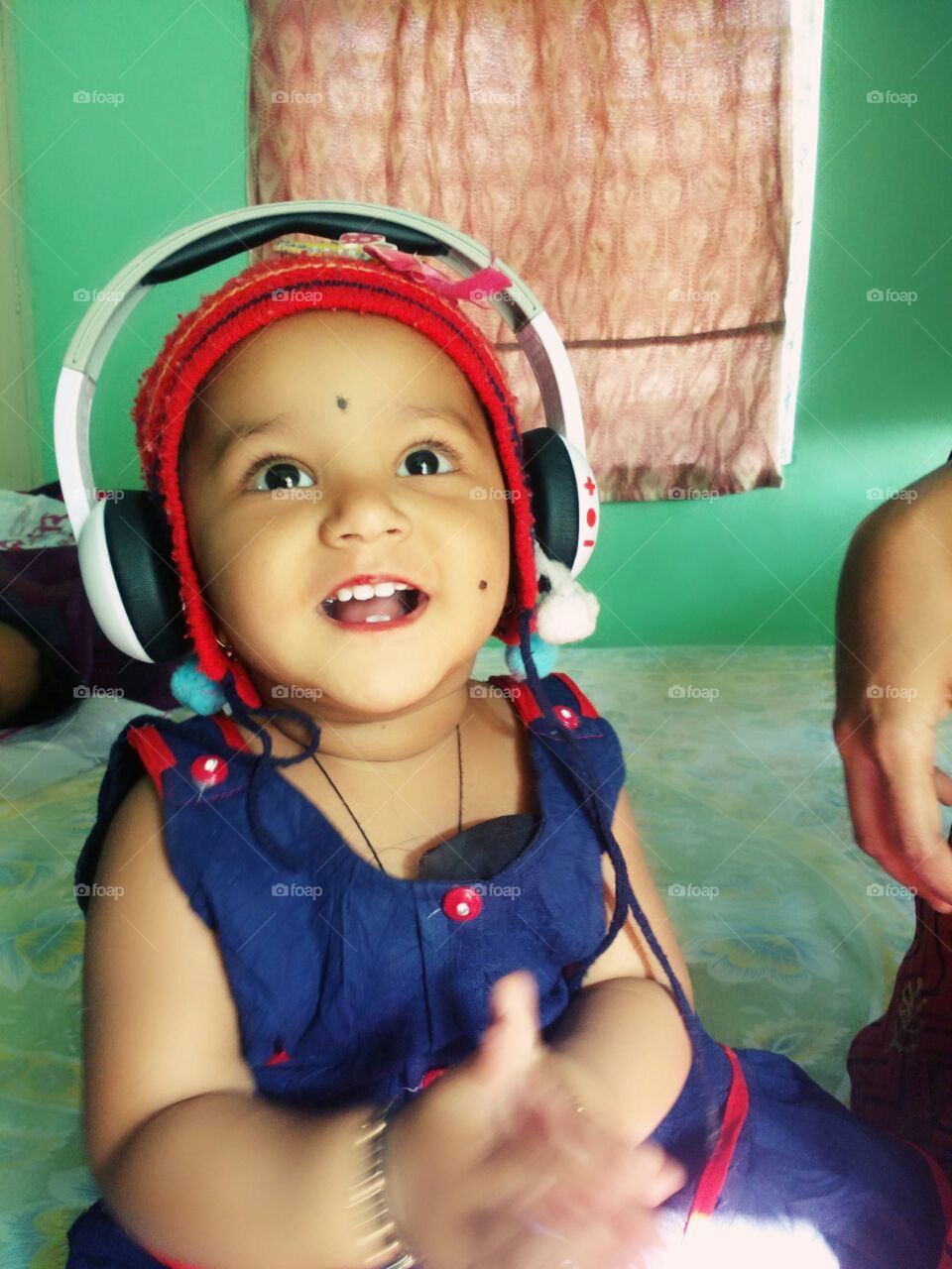 baby having fun listening to music first time