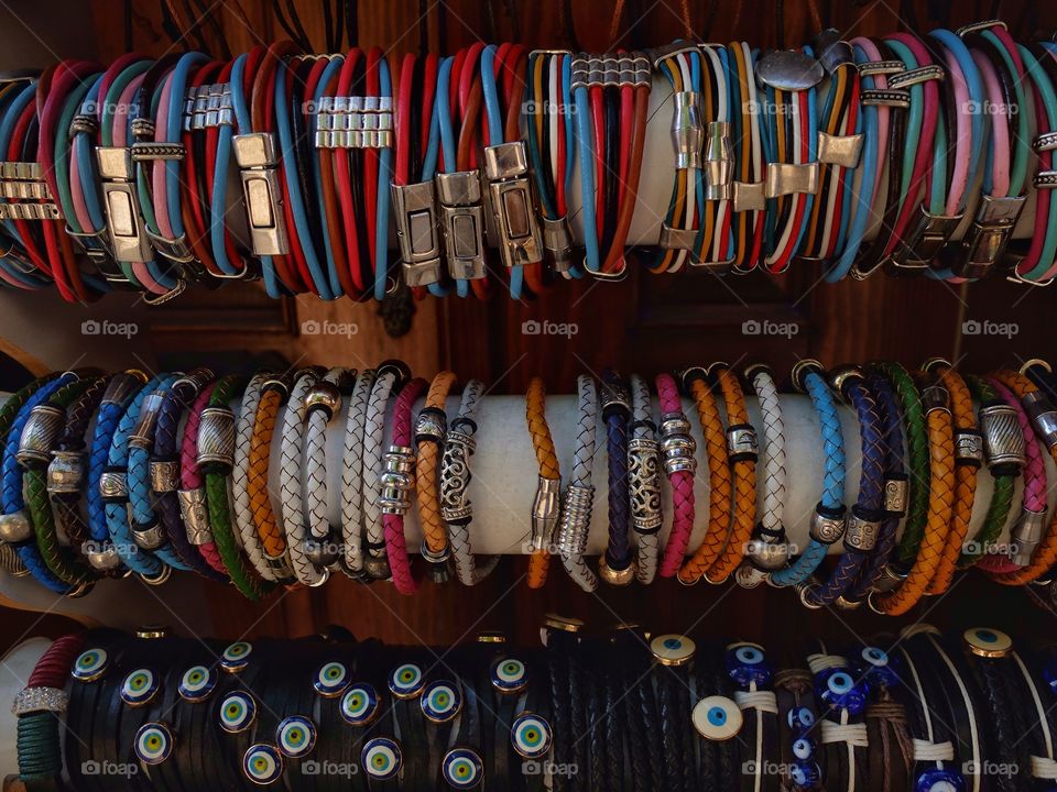 Bracelets on the wall. . When you go for a walk in Turkey I guarantee you'll see a lot of such stuff. 