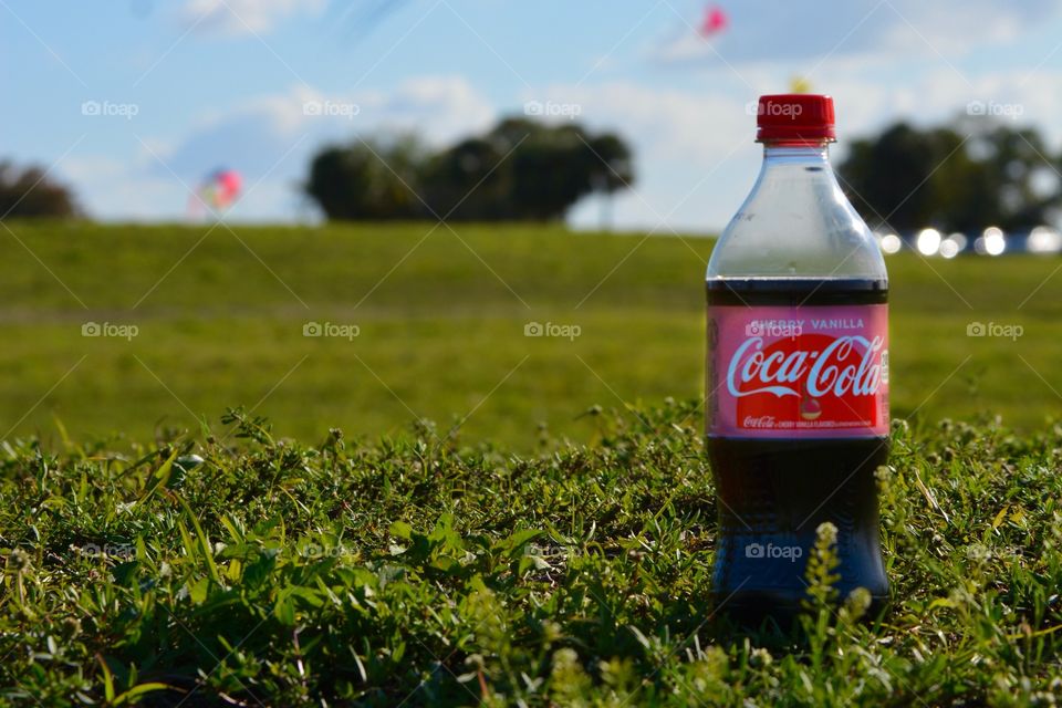 Outside with kites and coke