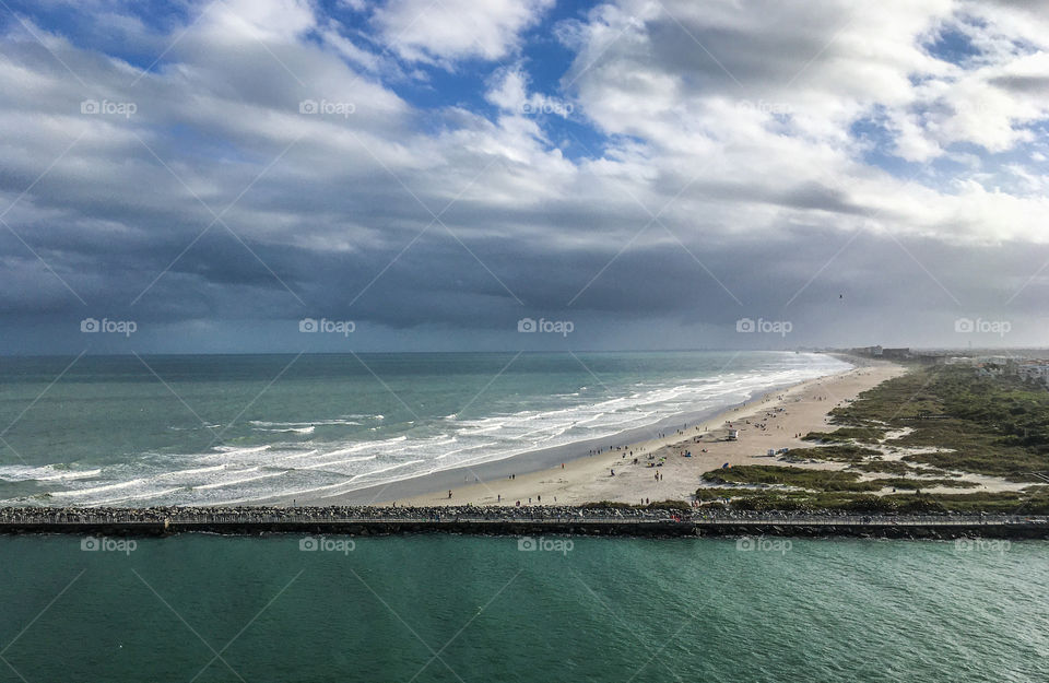 View from an upper deck of a cruise ship leaving Port Canaveral, Florida at the beginning of its journey 