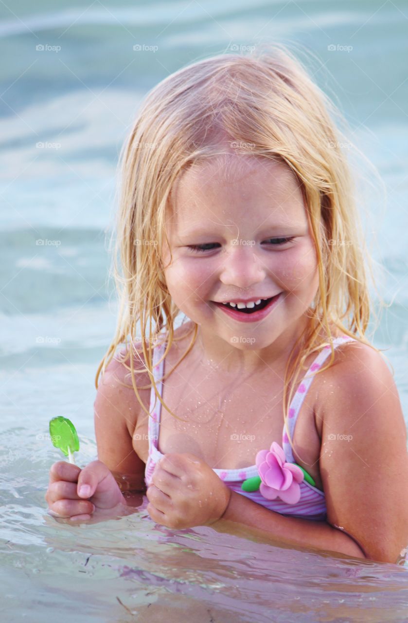 Enjoying A lollipop in the ocean