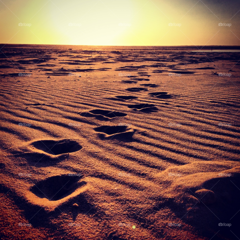 sunset sand path footsteps by alicedebarrau