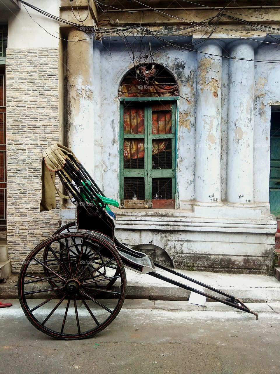 Hand pulling rickshaw,  Calcutta.
