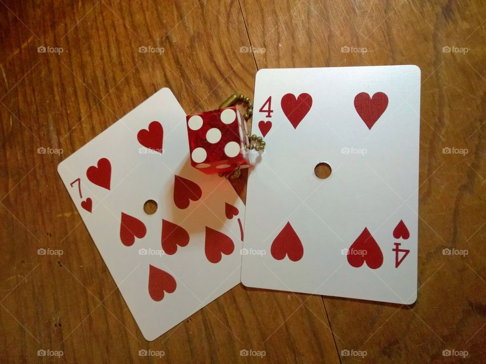 A die and two cards.