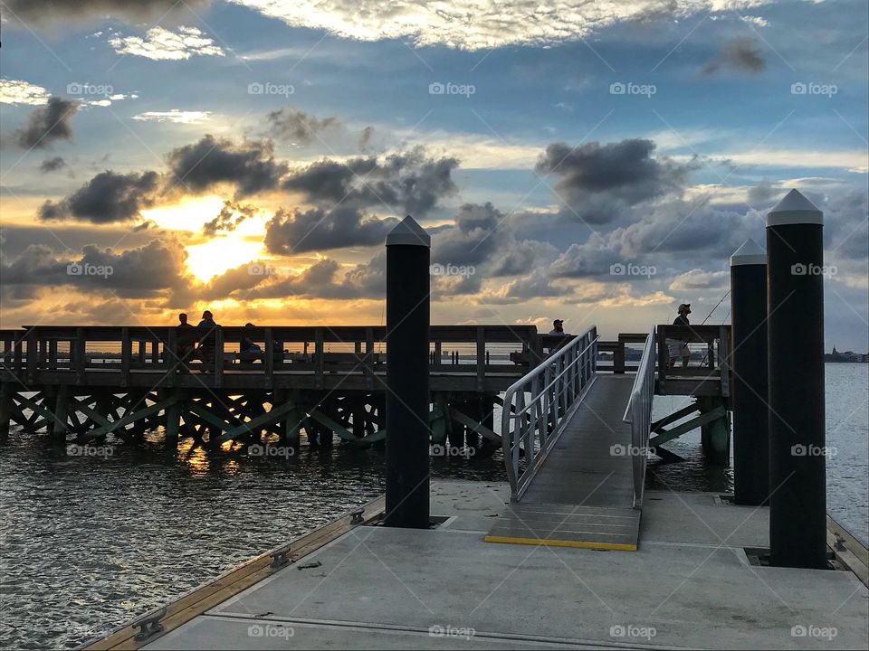 Watching the sun set from a floating dock and pier