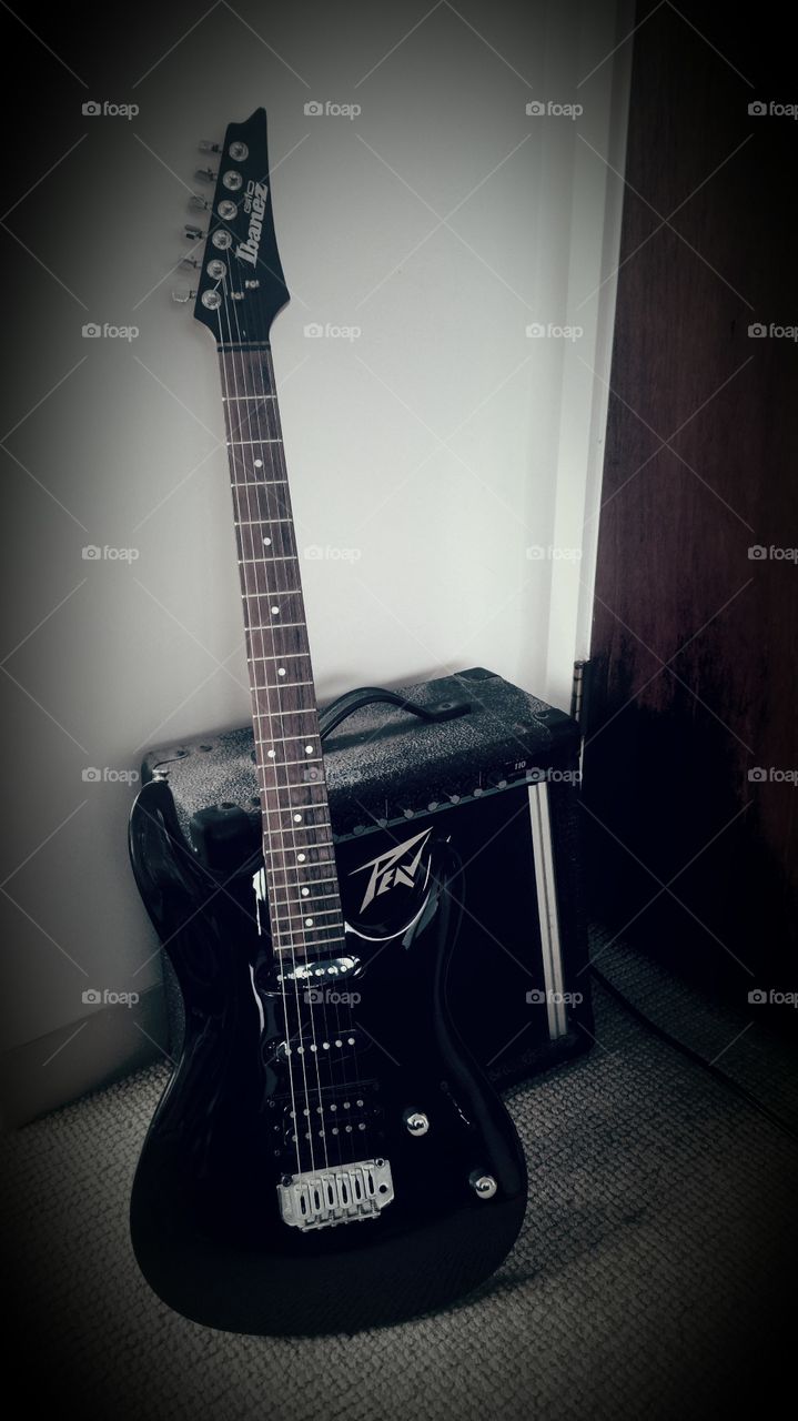 My old electric . Dusty electric guitar and amp