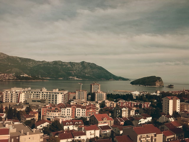 city, mountains, sea and sky