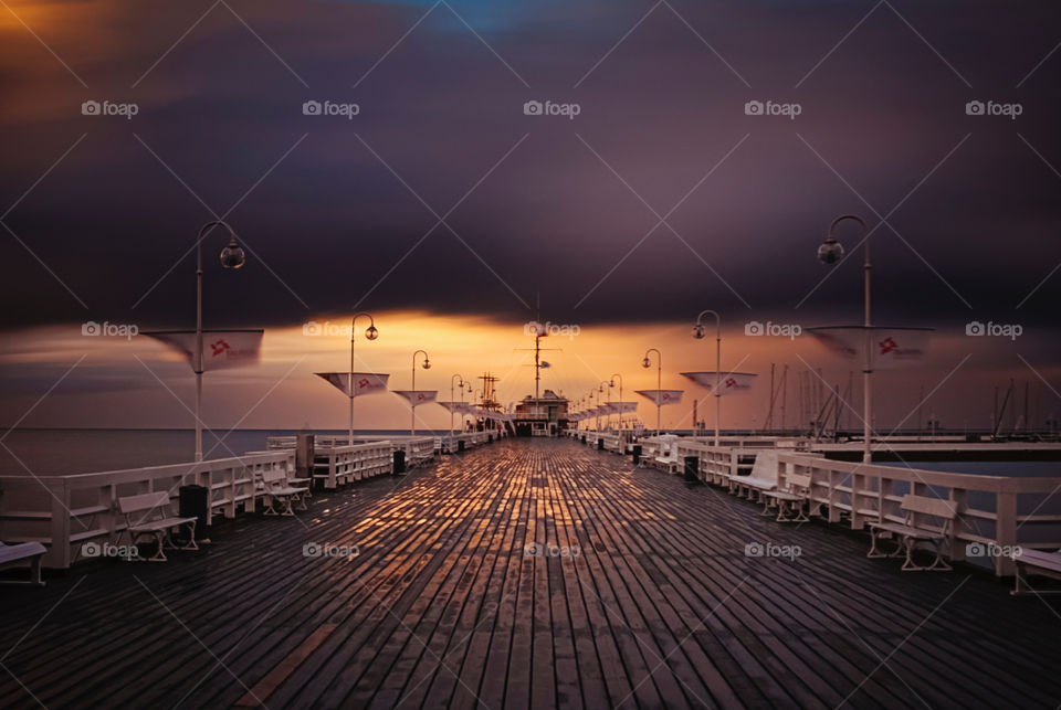 Fantastic pier in Sopot after the storm at sunset
